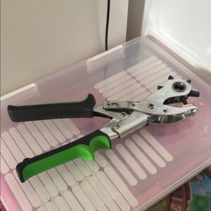 Green and Black Leather Hole Punch Tool